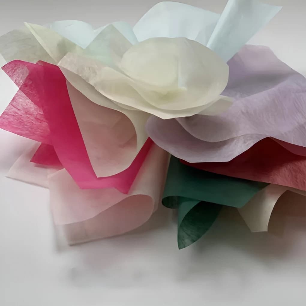 Non-woven fabric made from recycled rPET flakes.