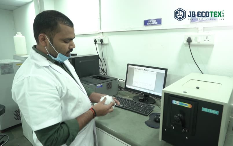 JB Ecotex laboratory technician testing recycled polyester fibre quality